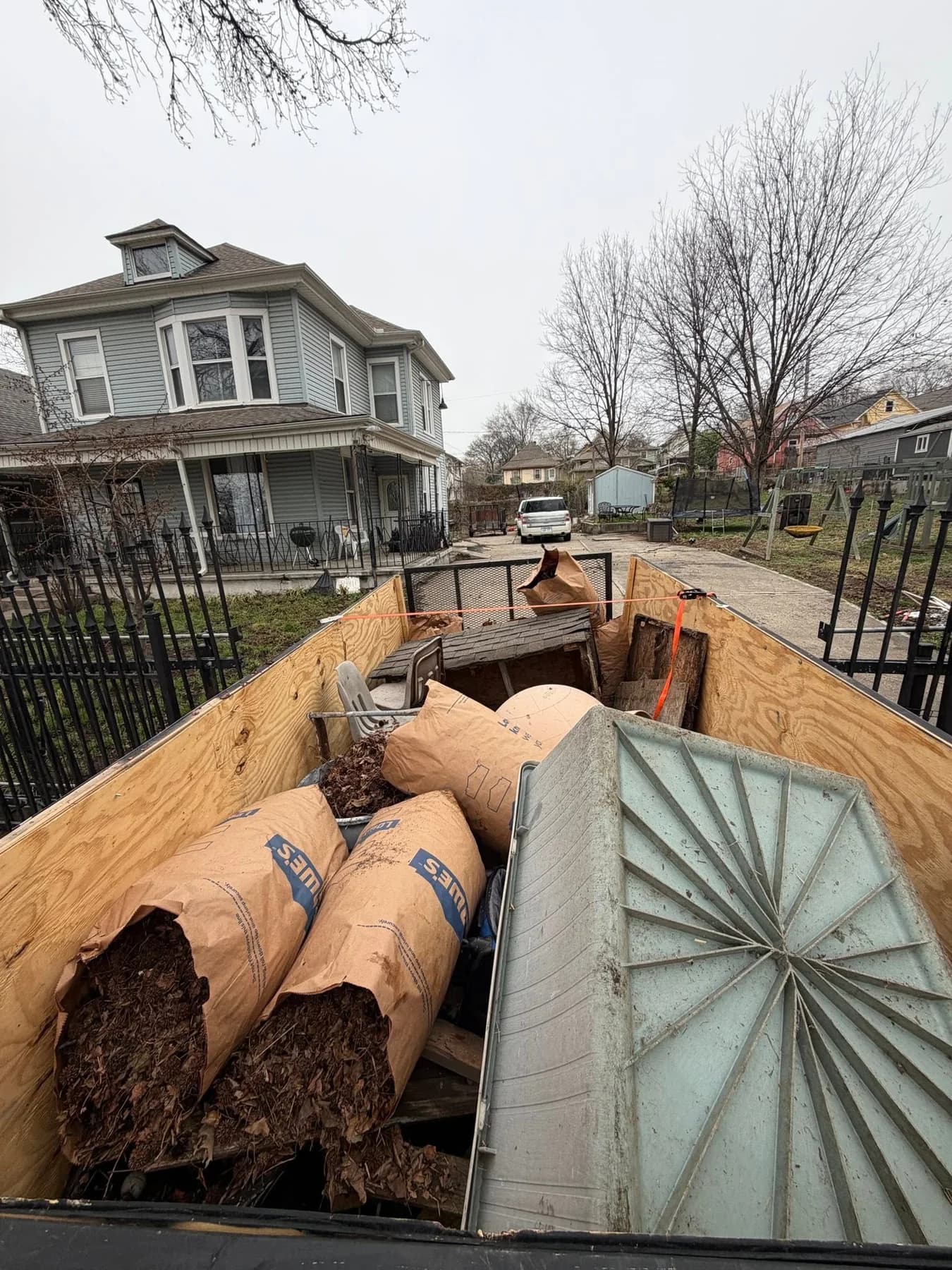 Trailer carrying construction and cleanout debris