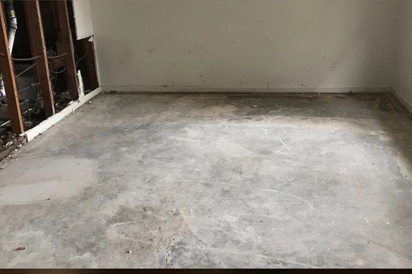The same interior room cleared after demolition debris removal
