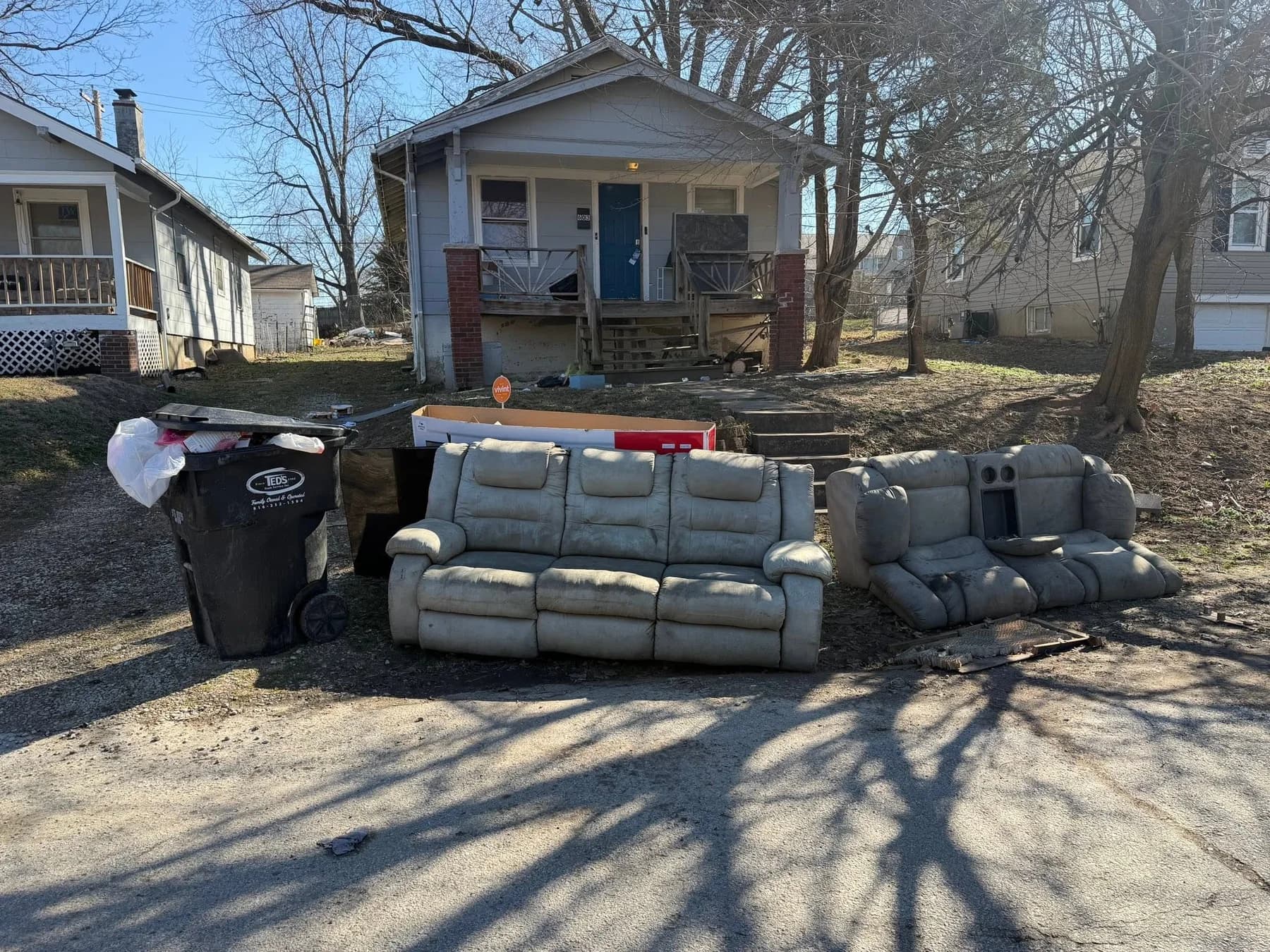 Couches and household furniture staged for removal